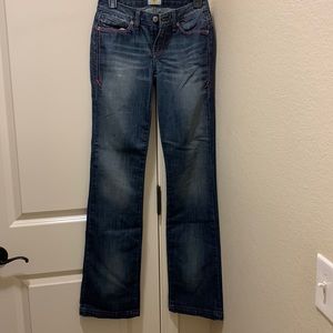 Antik Denim boot cut jeans with pink stitching size 26 waist.